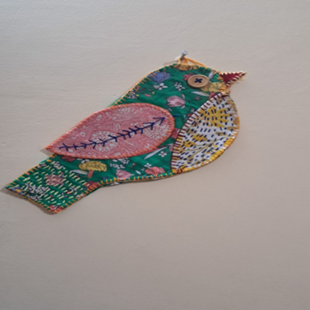 Patch work and embroidered wall hanging